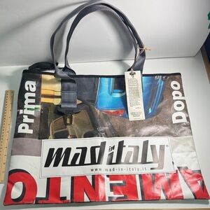 Advertisment Poster Recycled to Tote Bag - with seatbelt handles one of a kind